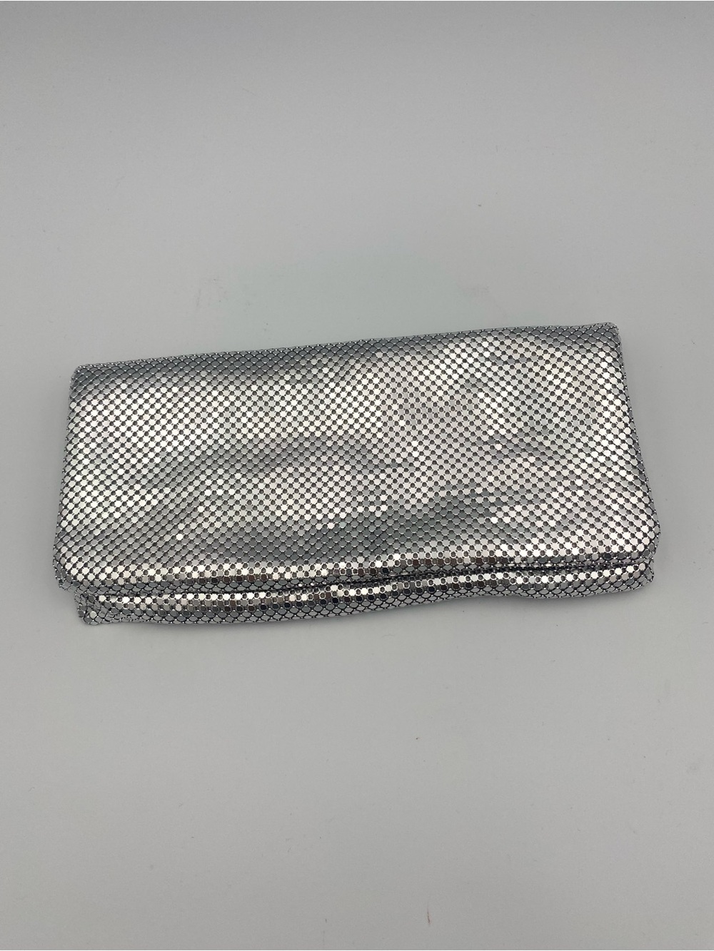 La Regale Silver Metallic Mesh Fold-Over Clutch